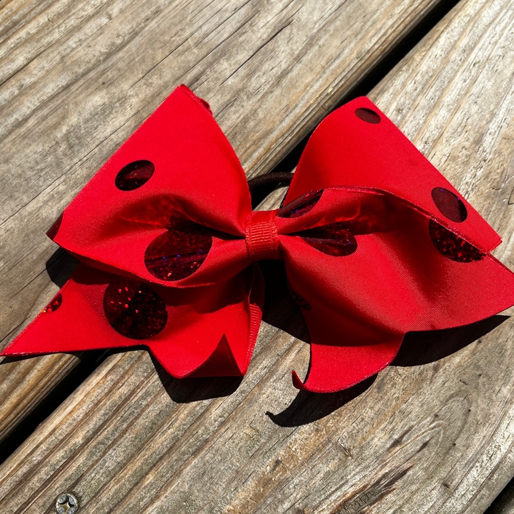 Red cheerleading bow